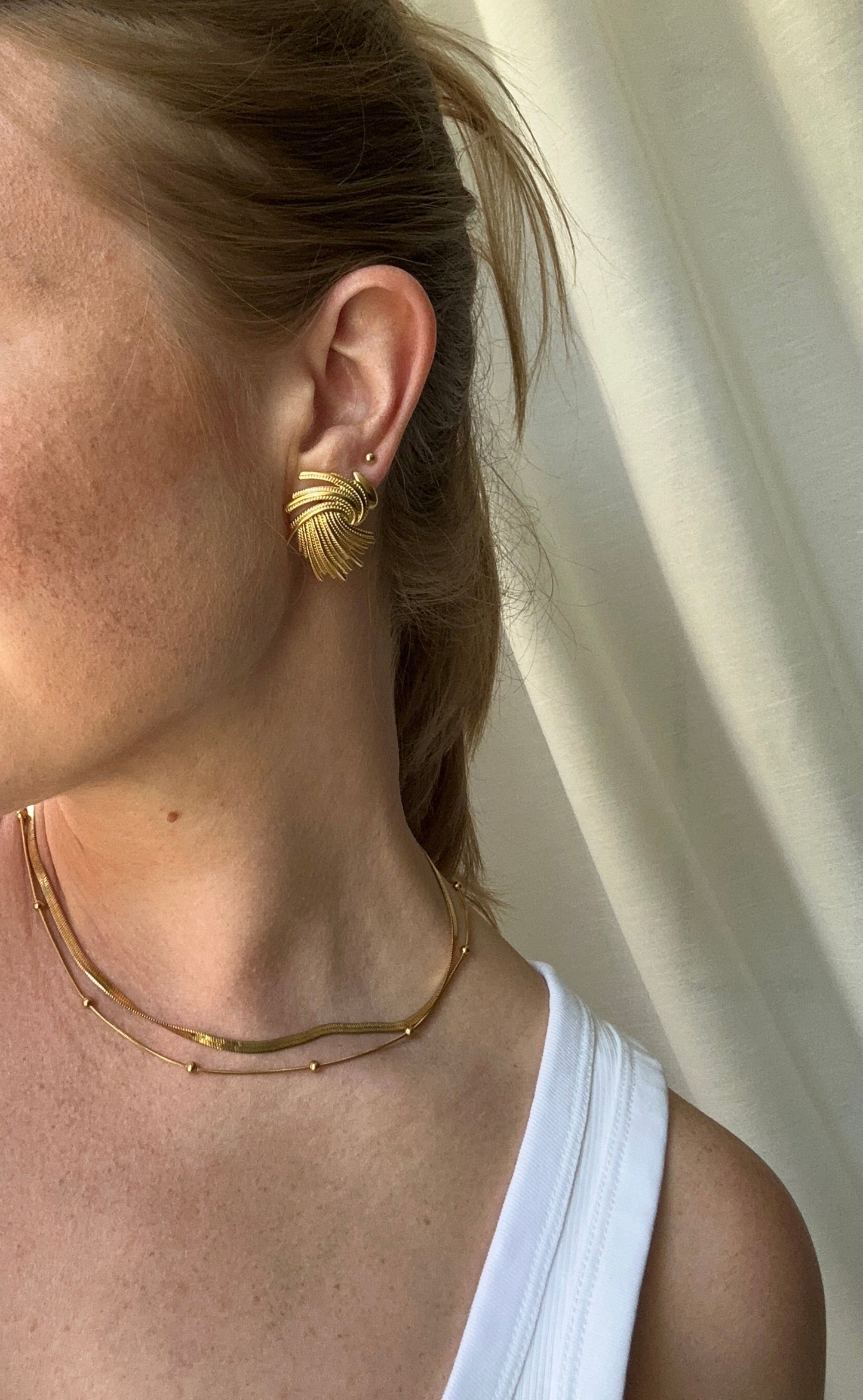 Aurora gold statement earrings